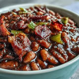 Juneteenth BBQ Baked Beans with Bacon, a smoky-sweet, slow-cooked Southern classic.